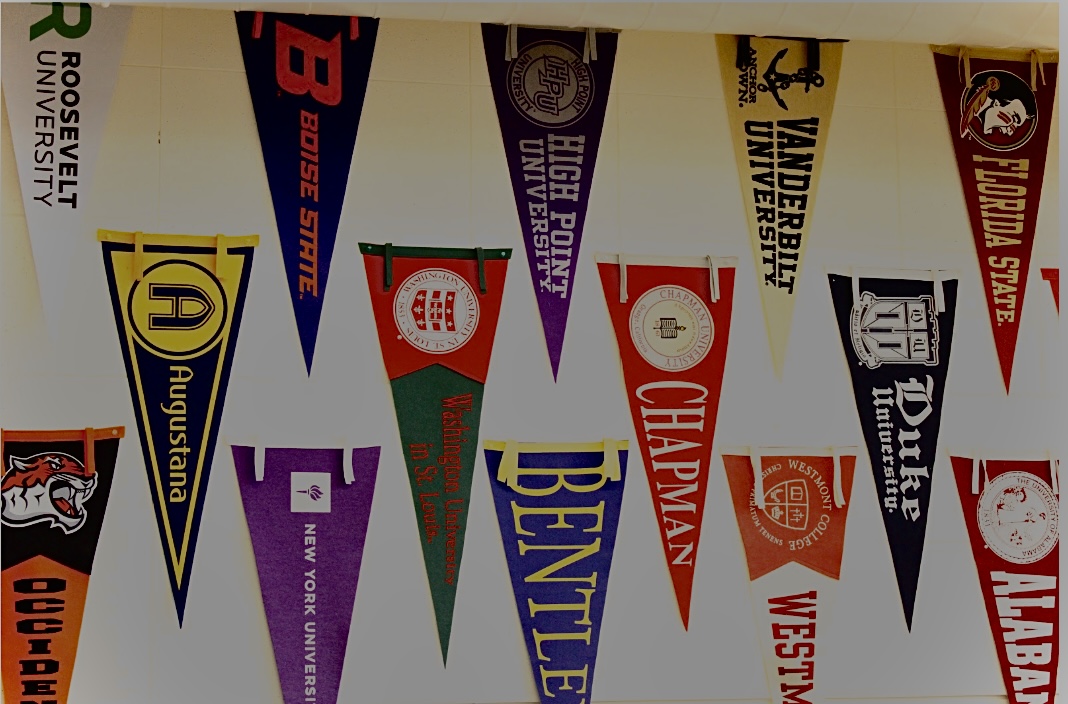 Wall of college pennants proudly hung about the walls of the SBHS College and Career Center. Image Credit: Claire Putnam