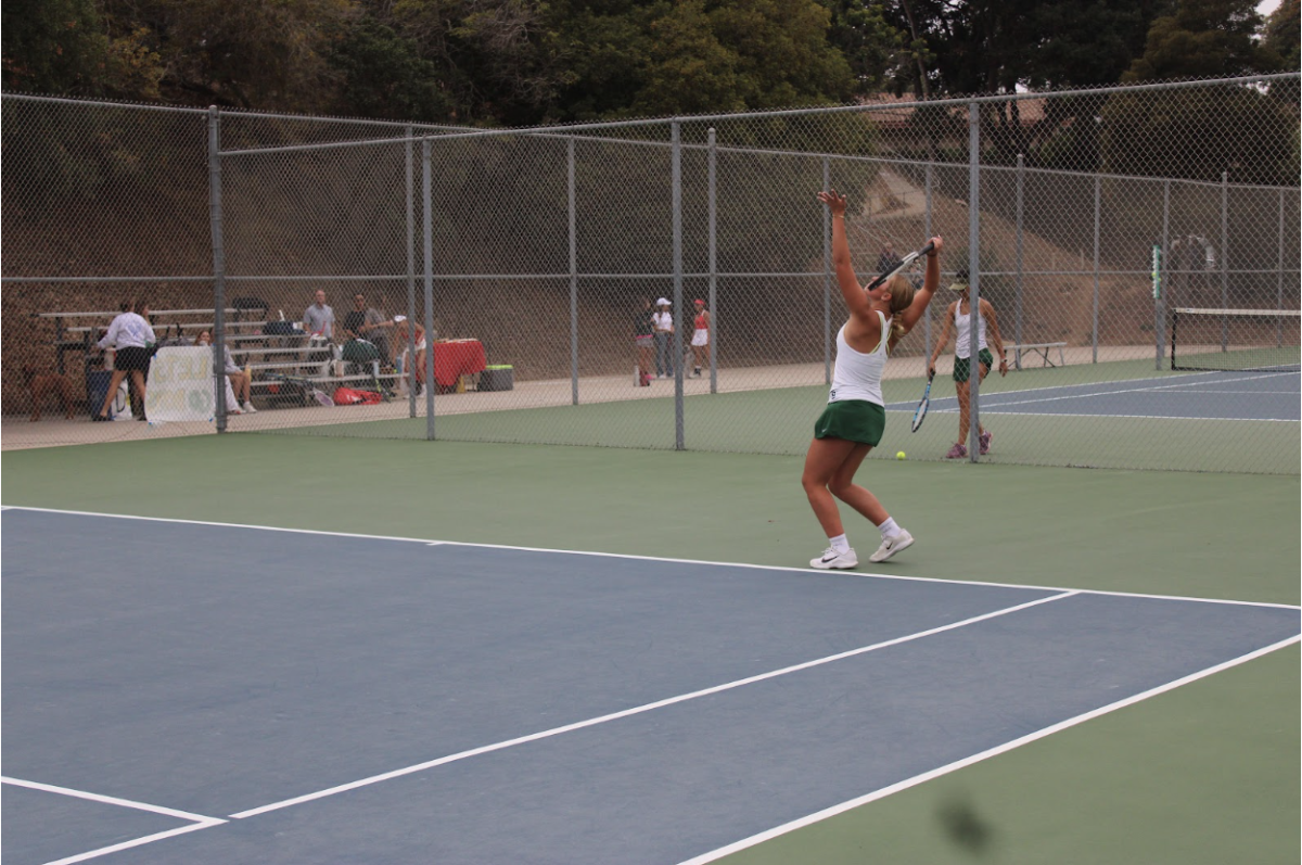 Kana Wolf gets ready to serve in a match against San Marcos. 
Image Credit: Daniela Ortega