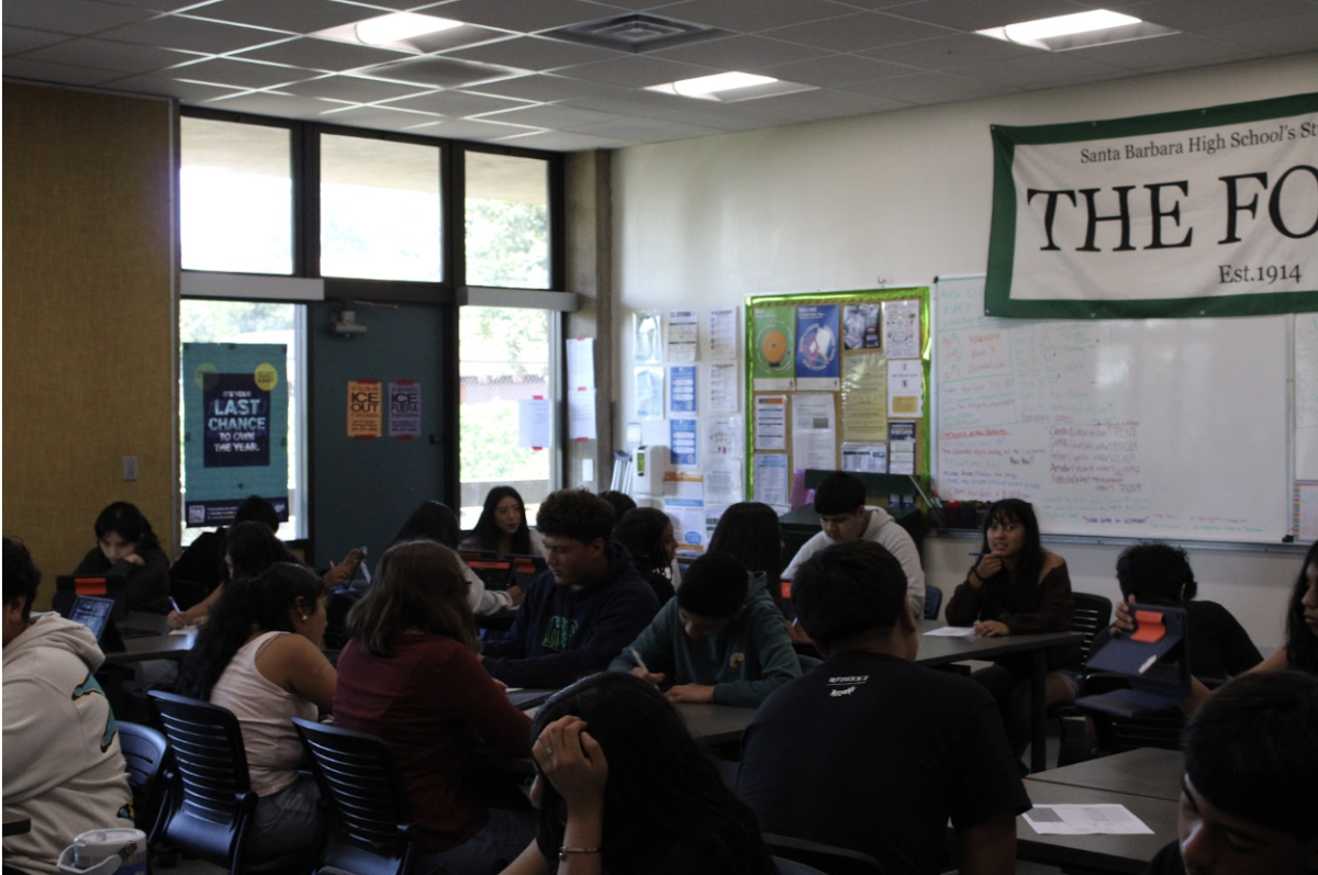AVID 9 students are updating their progress on individual SMART goals. Image Credit: Daniela Ortega