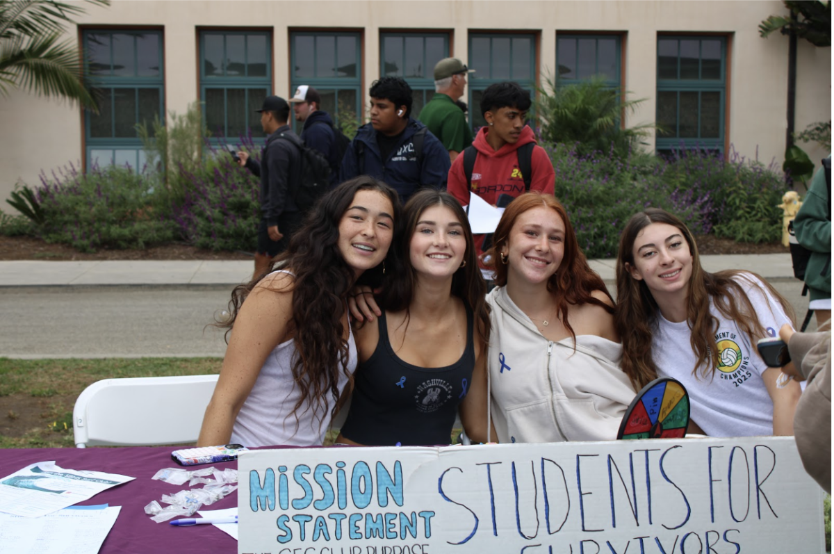 
Leaders of the Students for Survivors Club eager to welcome potential members.
Image Credit: Kiki Oser
