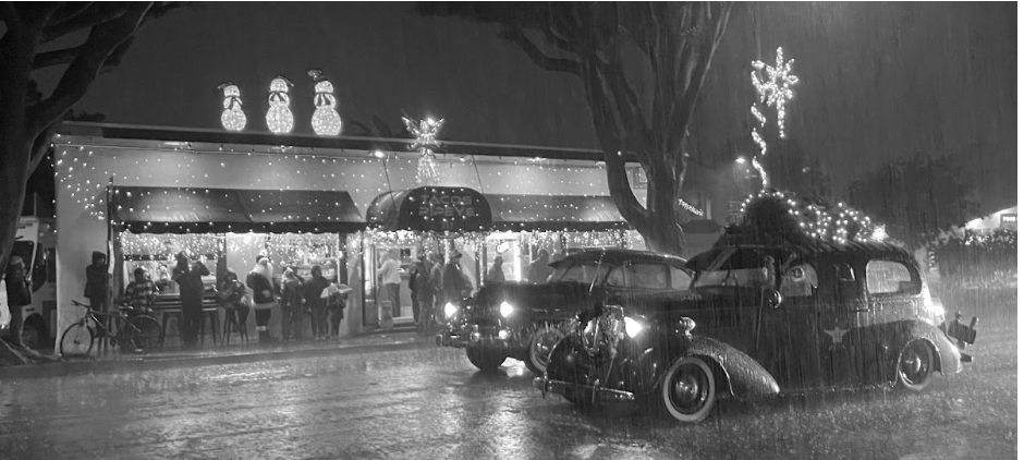 Classic cars roll down Milpas Street in the 2022 holiday parade.
Image Credit: Clara Watson