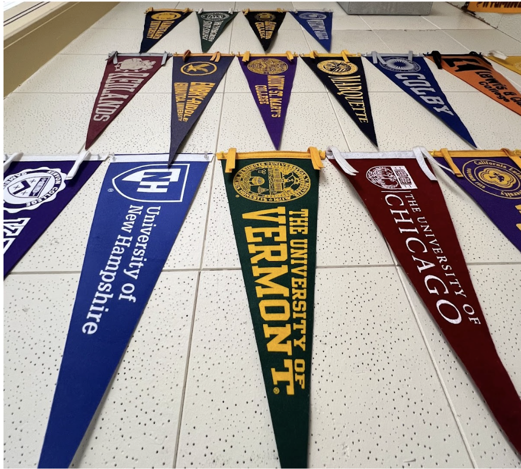 College is looming ahead: flags hung in the SBHS College and Career Center. Image Credit: Clara Watson