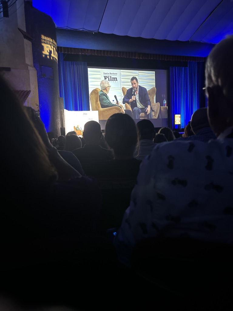 Maltin Modern Master Award winner Adam Sandler sits down with film critic and historian Leonard Maltin in the Arlington Theater Thursday night. Image credit: Ethan Maday
