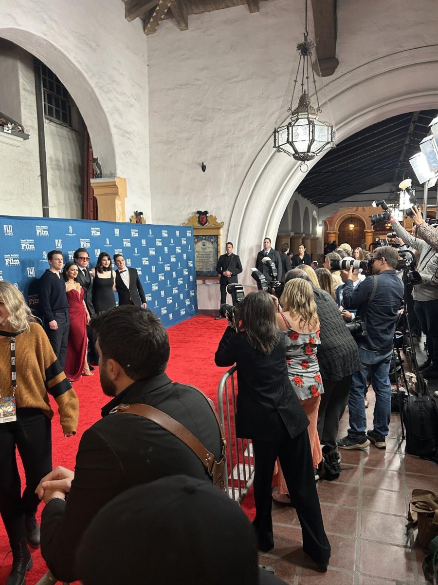 A Mosquito In the Ear Filmmakers pose on the red carpet. Photo by Ethan Maday