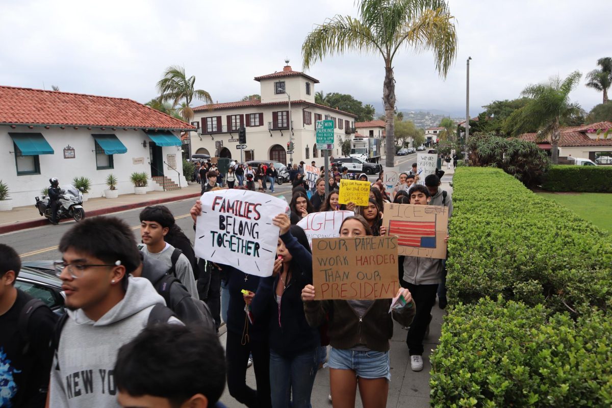 The students walk down De La Guerra street to city hall on a Feb 10 walkout. Photo by Ethan Maday