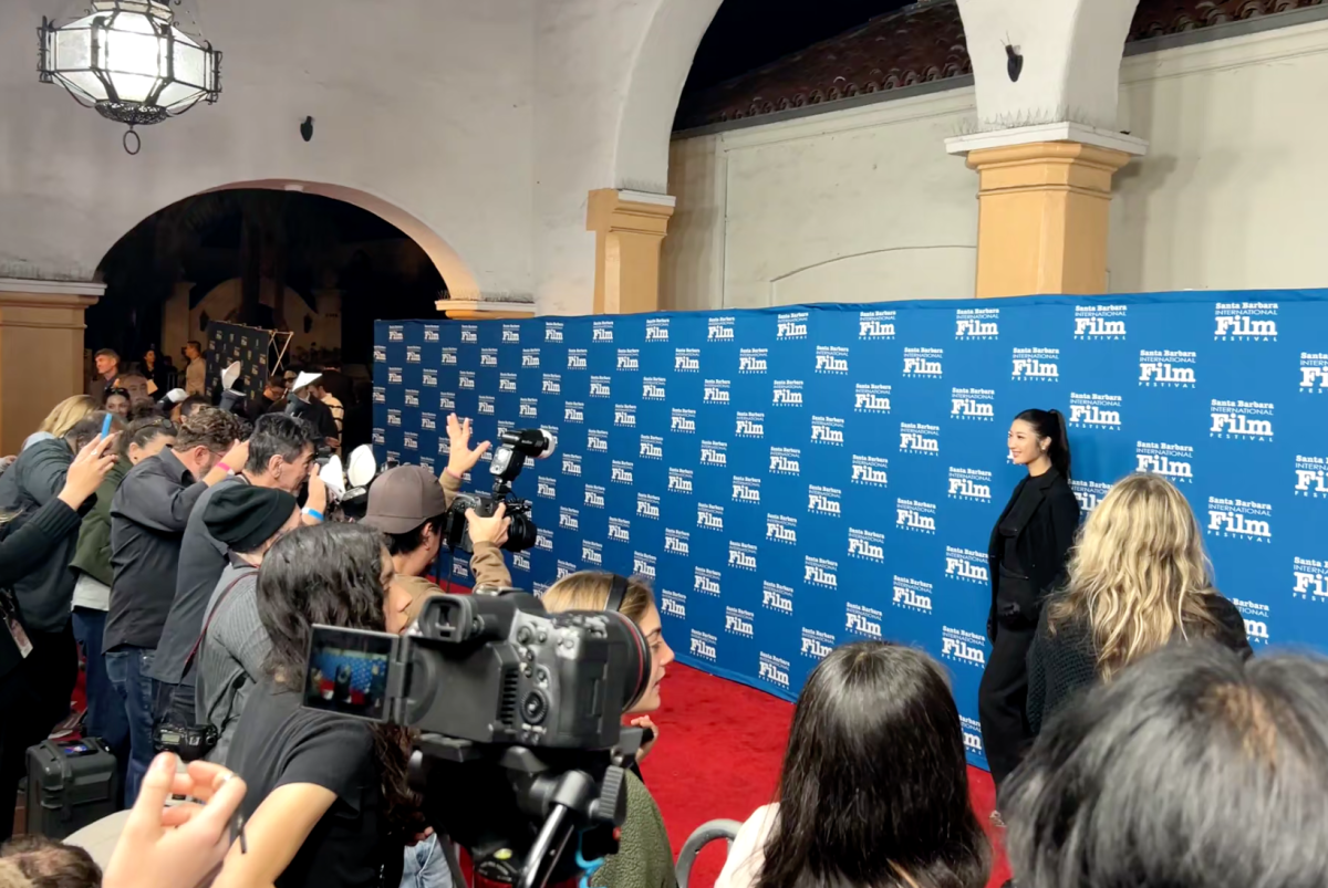 Singer and awardee EJAE walks the red carpet. Photo Credit: Ethan Maday