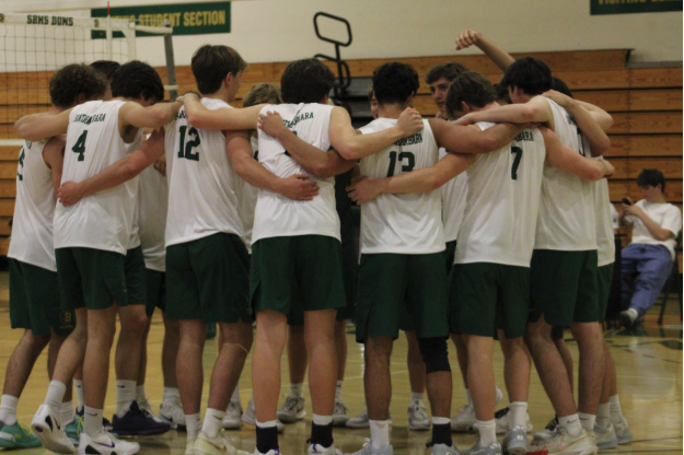 Varsity boys huddle and get hyped for the big game.
Image Courtesy of Jailyn Dixon 
