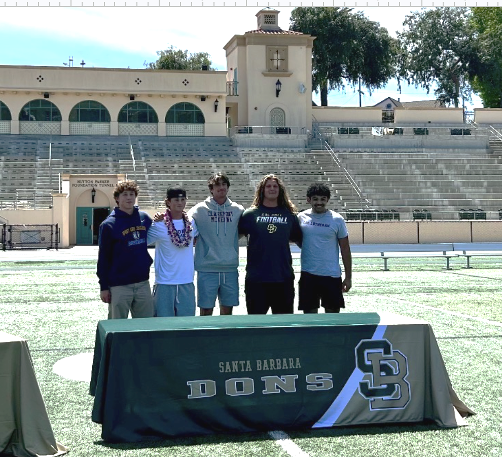 Santa Barbara athletes pose after signing their commitment.
Photo courtesy of Ember Reiter 
