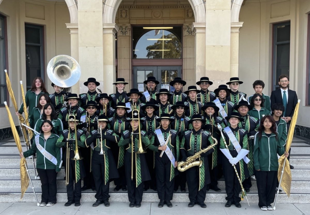 The band team all in outfits ready to perform at a school sporting event.
Photo Credits: Tyler Ravelli