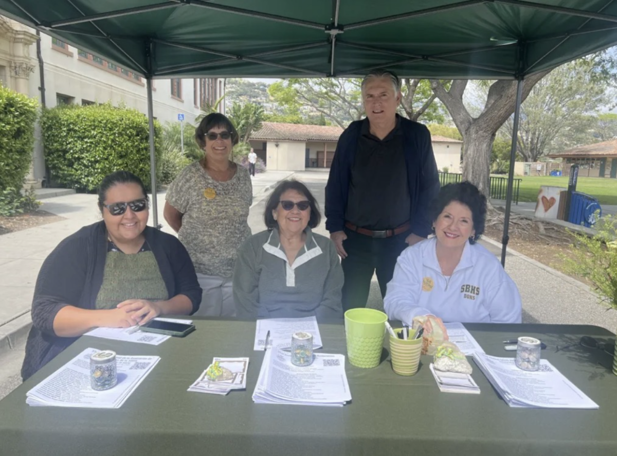 The Alumni Association Board members checking in attendees.
Photo Credit: Talli Richards Versola
