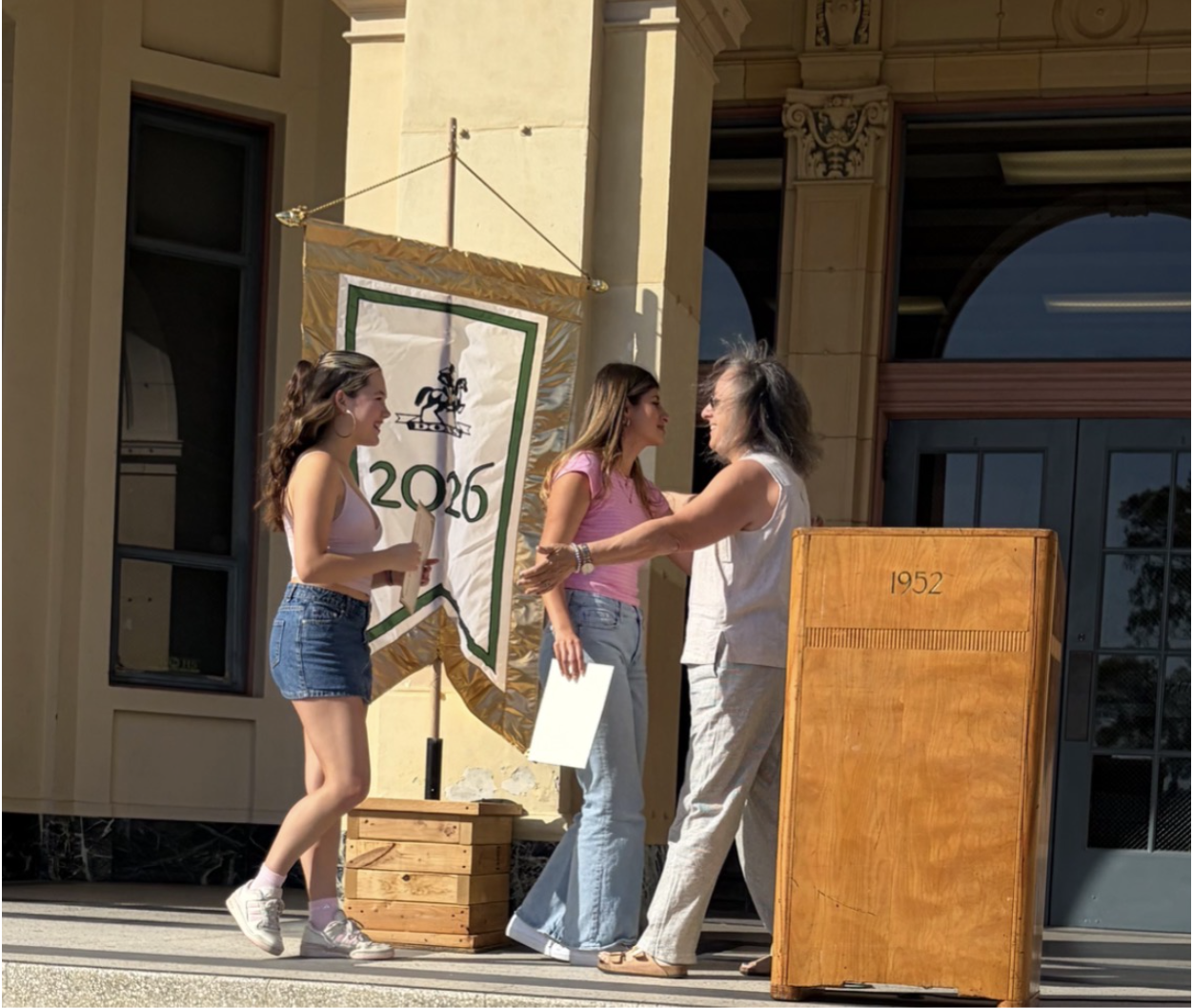 Cloutier presents the Top Don award to The Forge senior editors. 
Image credit: Iris Heckes
